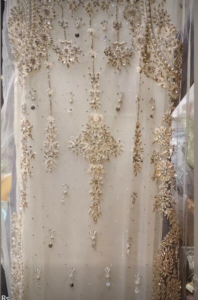 Beautiful and stylish women's outfit decorated with embroidery