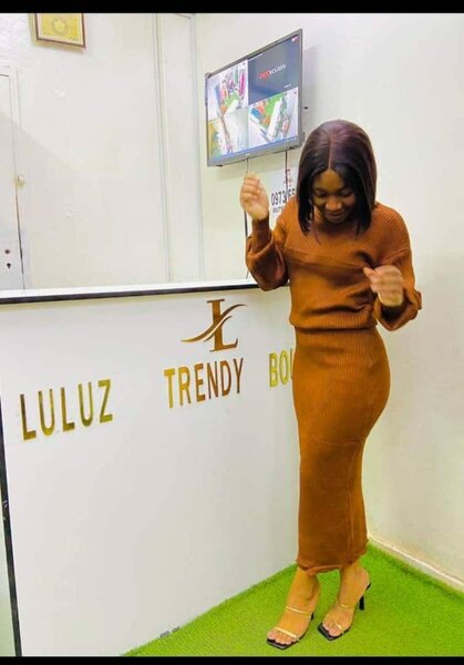 Women's knitted suit, skirt + sweater