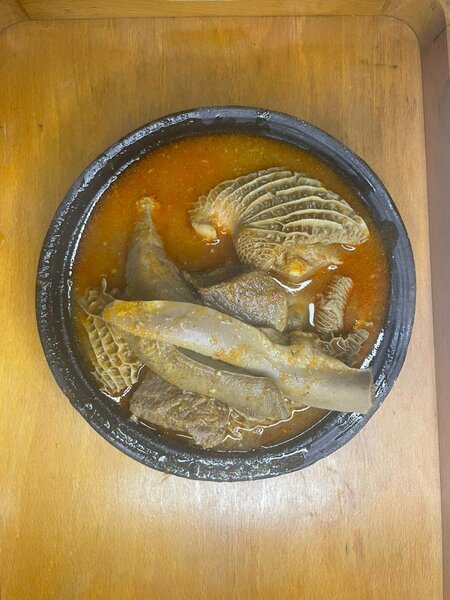 Poisson épicé et tripes