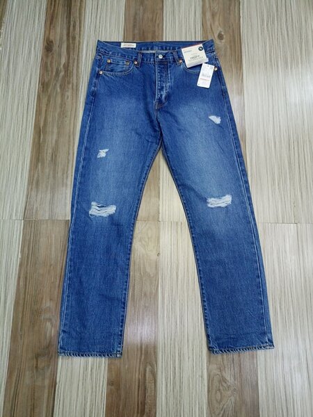 Stylish jeans with blue shade ripped