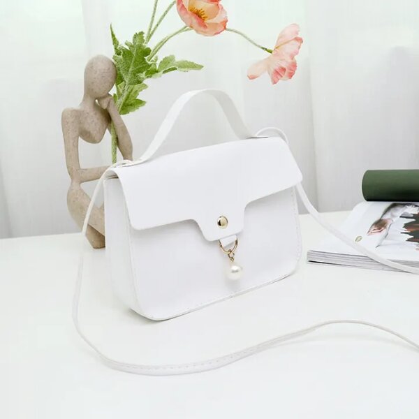 Petit sac à main élégant perlé