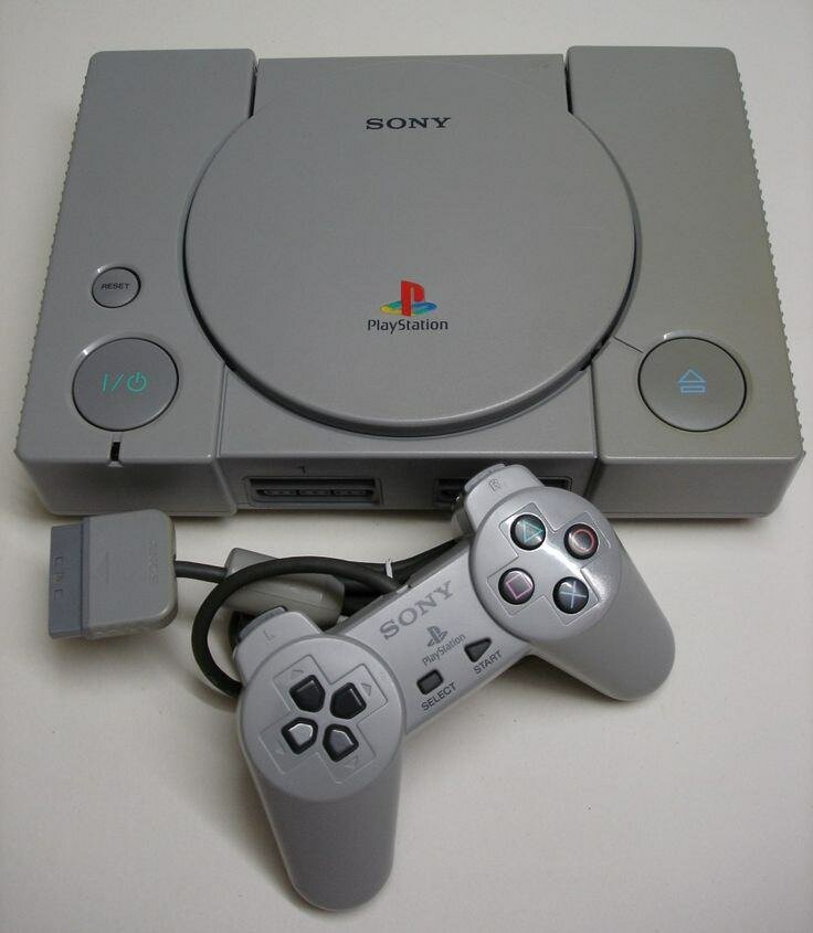 Console Sony PlayStation PS1 grise avec manette