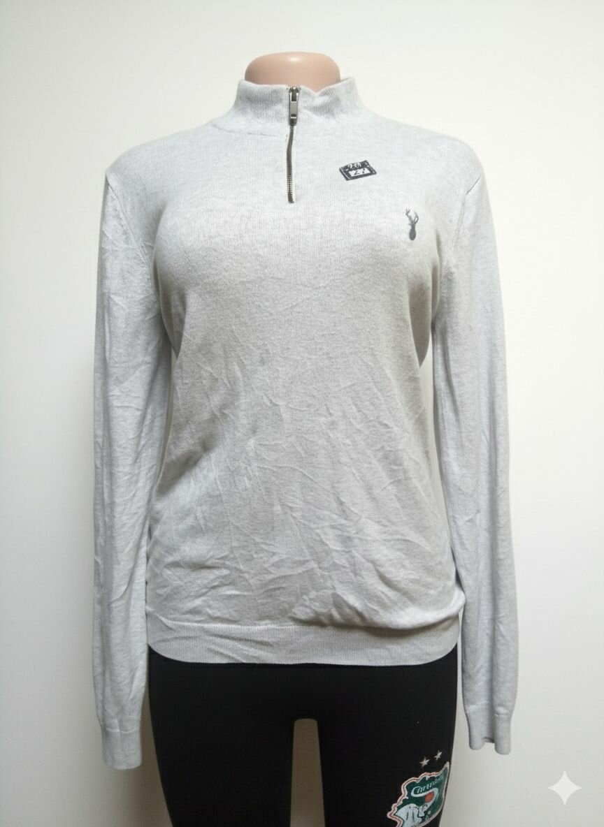 Pull gris à col zippé