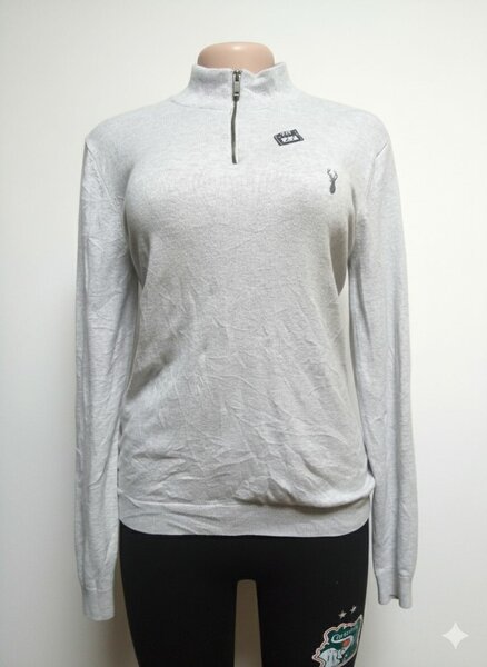 Pull gris à col zippé