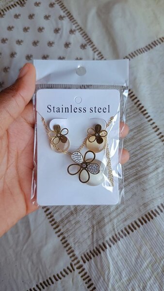 Parure fleur acier inoxydable