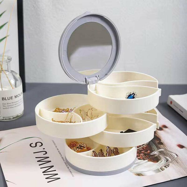 Boîte à bijoux rotative avec miroir