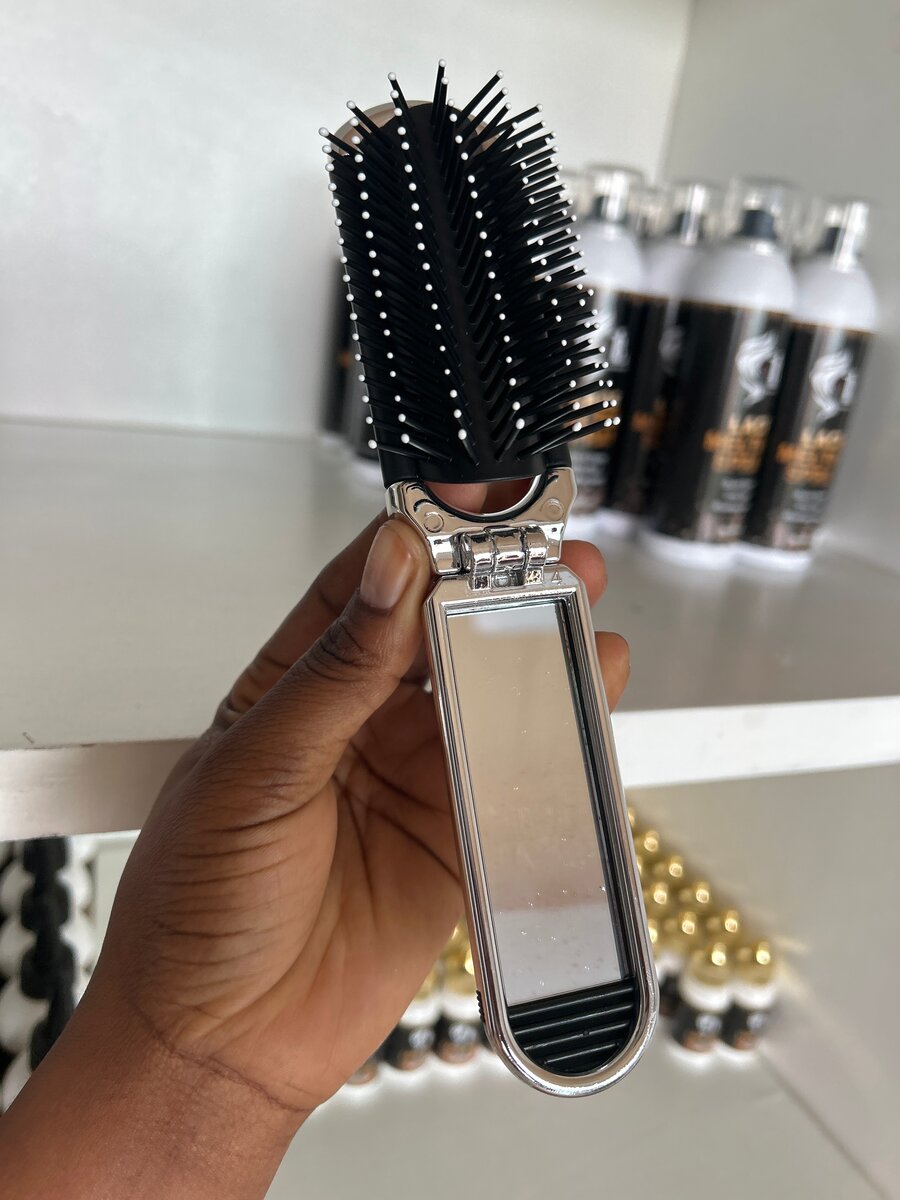 Brosse pliante avec miroir