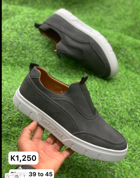 black perforated loafers