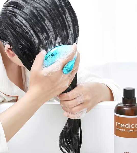 Brosse de massage pour cuir chevelu