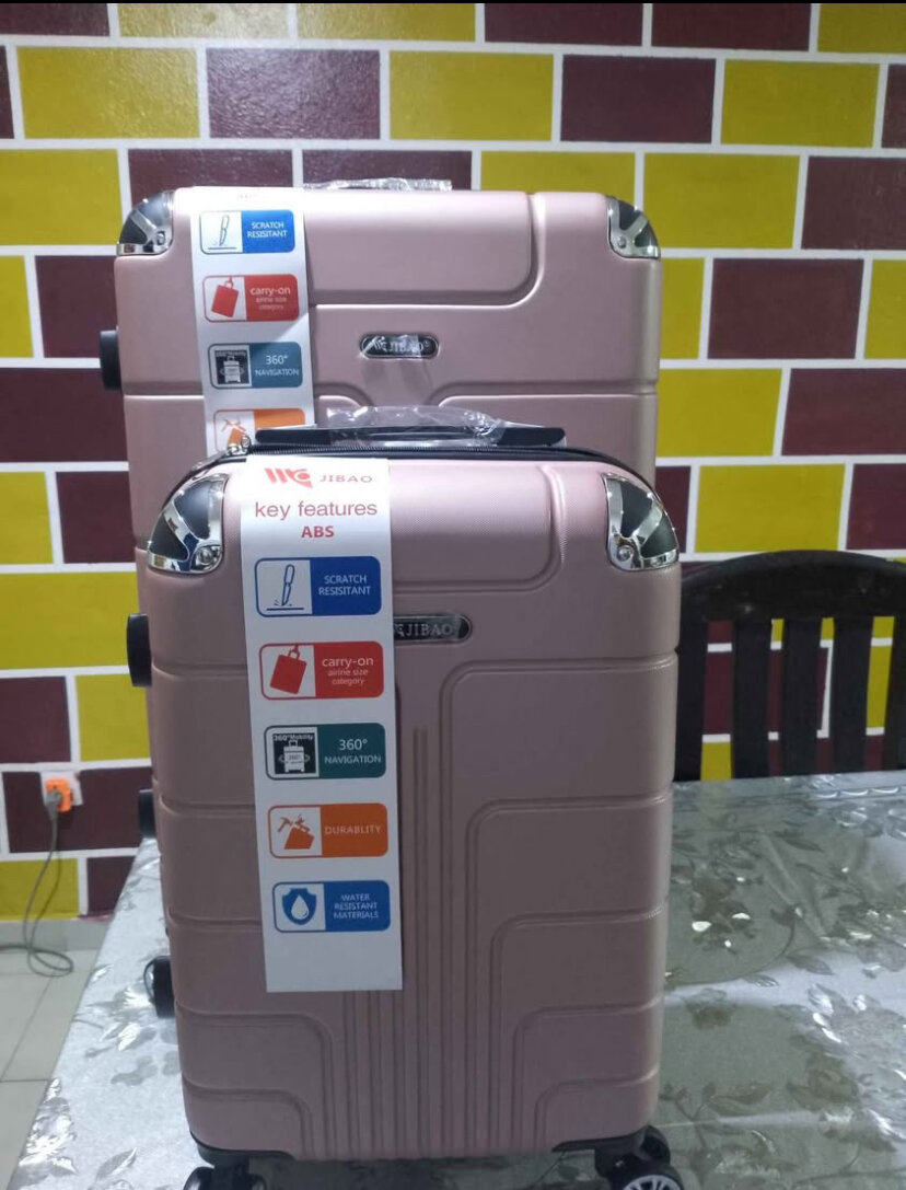 Valise rose ABS robuste pour voyages