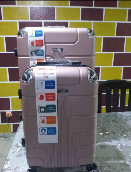 Valise rose ABS robuste pour voyages