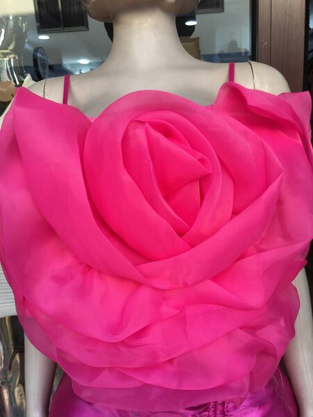 Tops available in white and pink