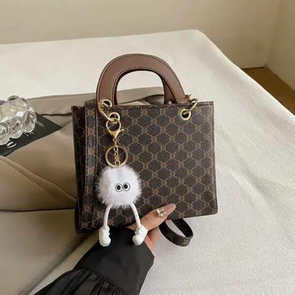 Sac à main élégant motif géométrique