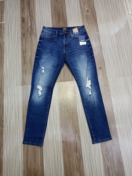 Stylish jeans with blue shade ripped