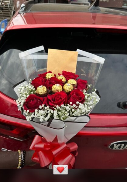 Bouquet de roses rouge avec chocolats