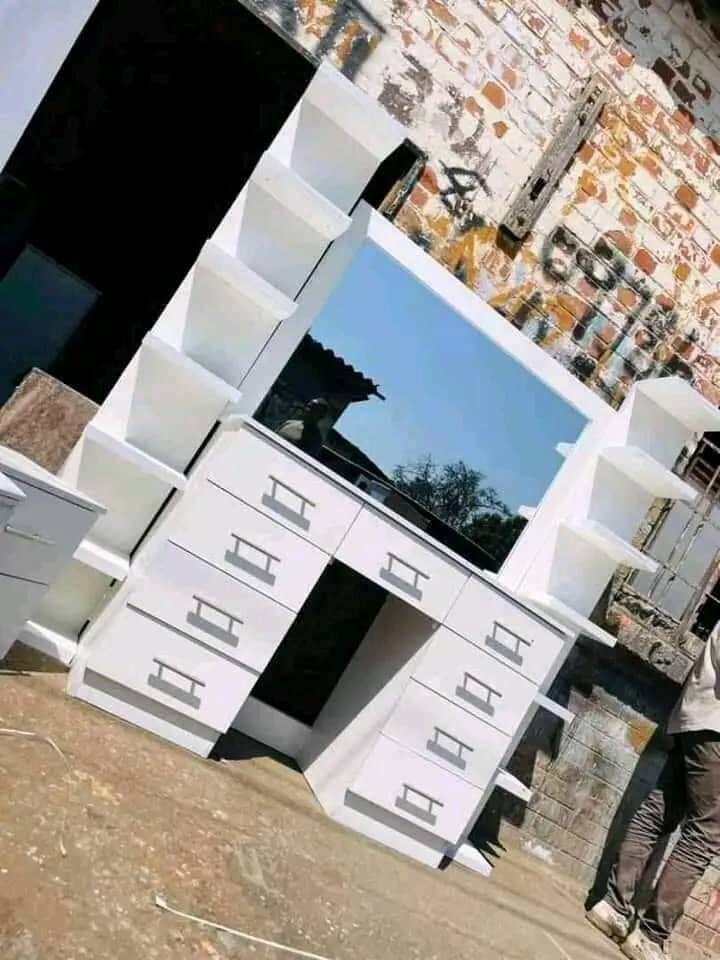 Dressing mirror and kitchen unit