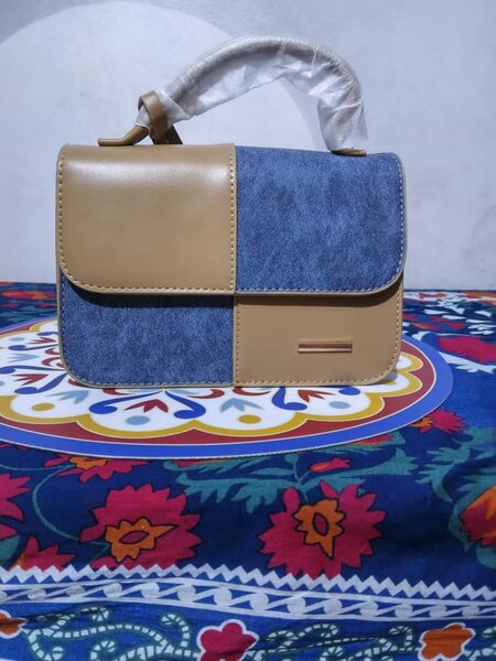 Sac à main bimatière chic