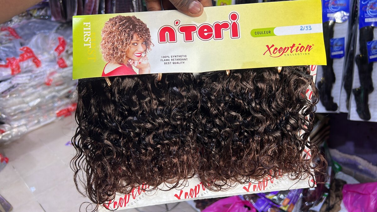 Extensions cheveux bouclés synthétiques