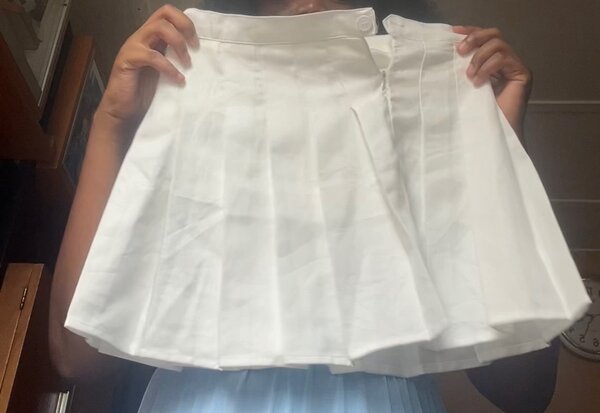Jupe plissée blanche élégante
