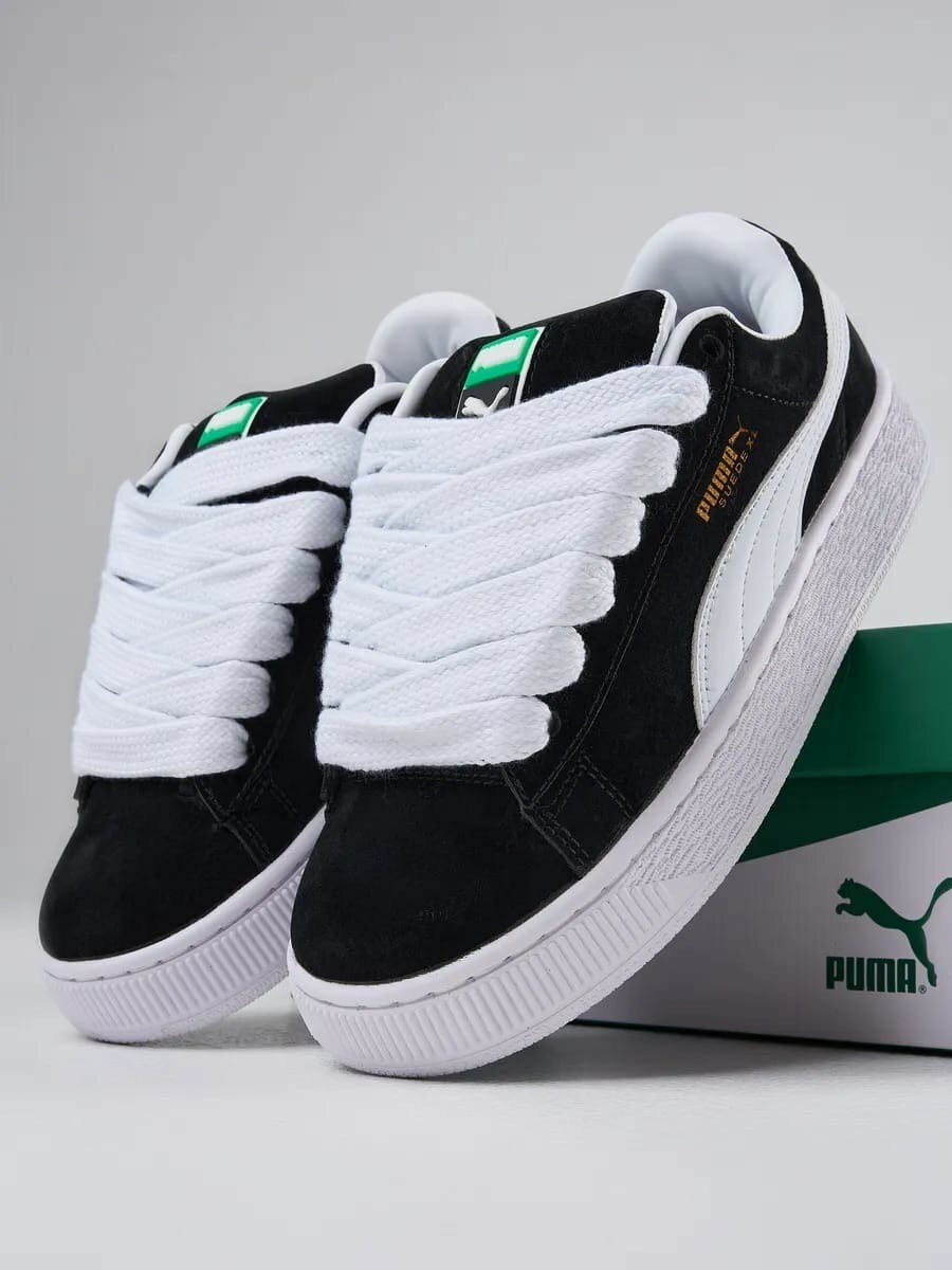 Baskets Puma Suede Noires Unisexes