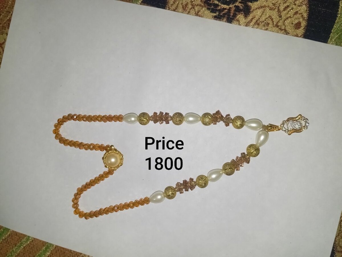 One kerat gold locket