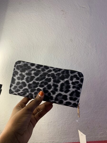 Portefeuille élégant avec pompon