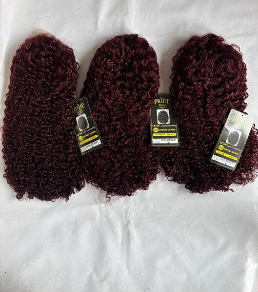 Perruques bouclées synthétiques