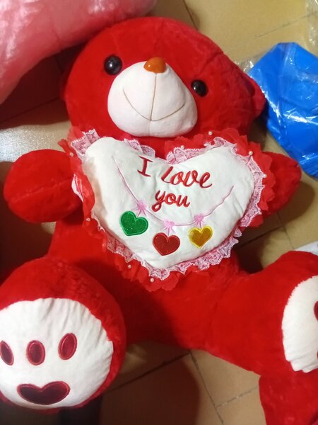 Ours en peluche géant rose