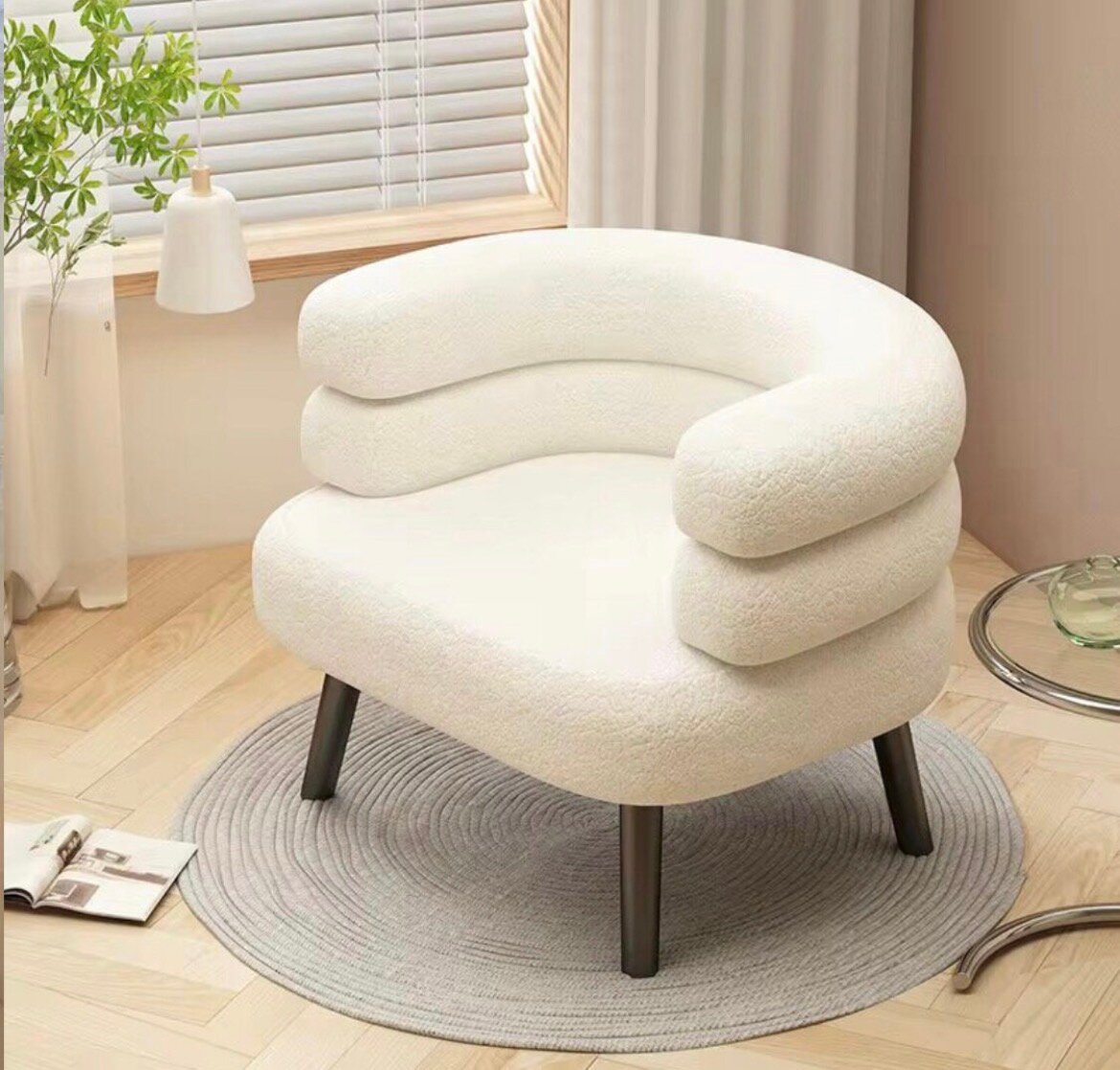 Fauteuil rond en tissu beige