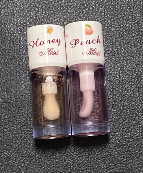 1 lip gloss au miel ou peach