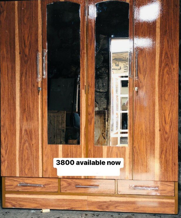 Beautiful brown wardrobe with mirror