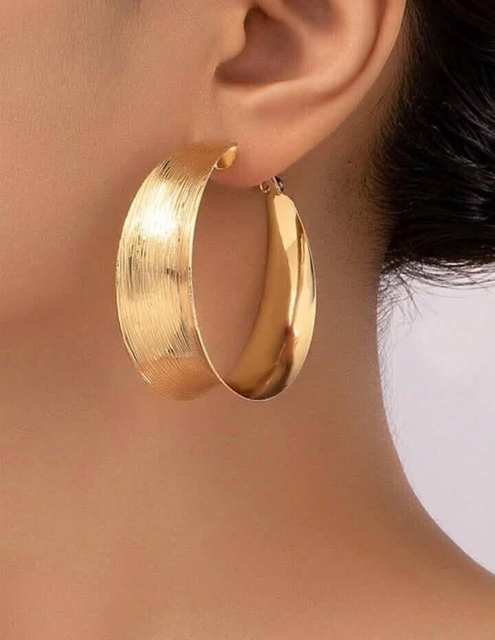 Boucles d'oreilles dorées tendance