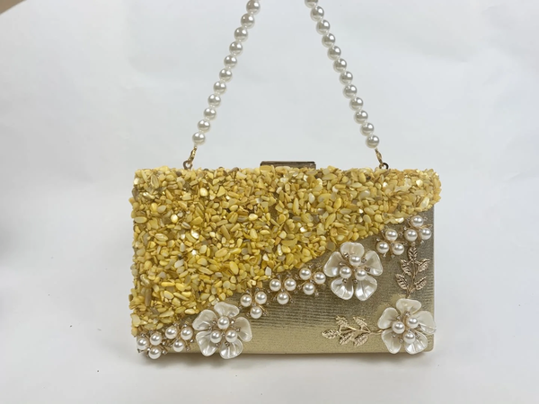 Clutch élégant perlé doré