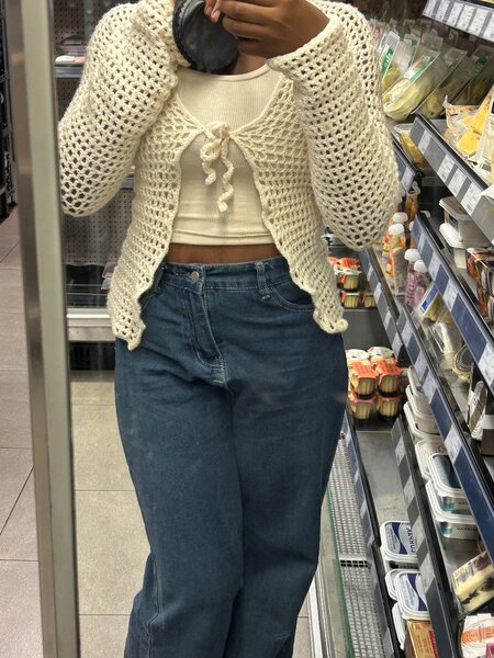 Cream white crochet cardigan.