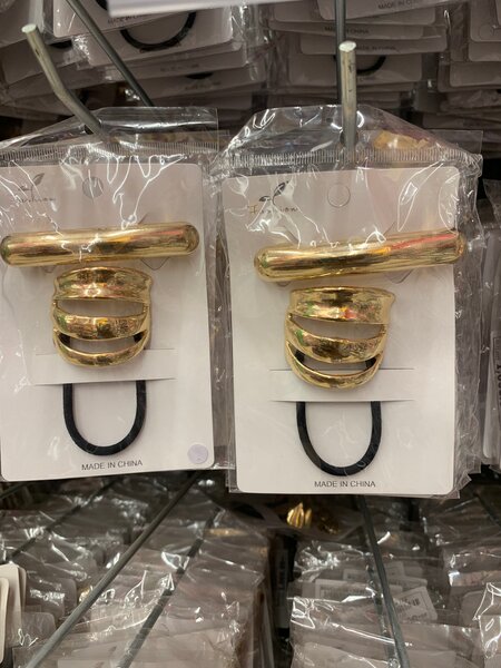 Pinces à cheveux dorées élégantes