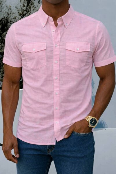 Chemise rose pâle poches devant