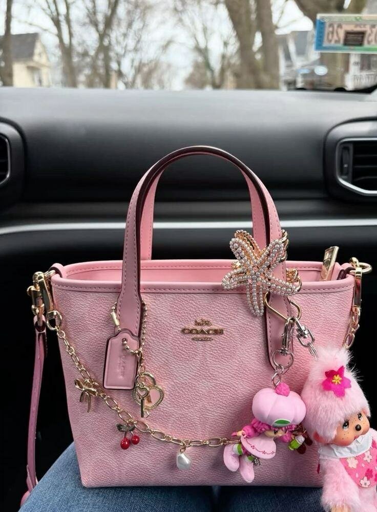 Sac à main COACH en cuir rose