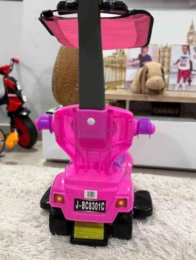 Voiture à pousser bébé rose