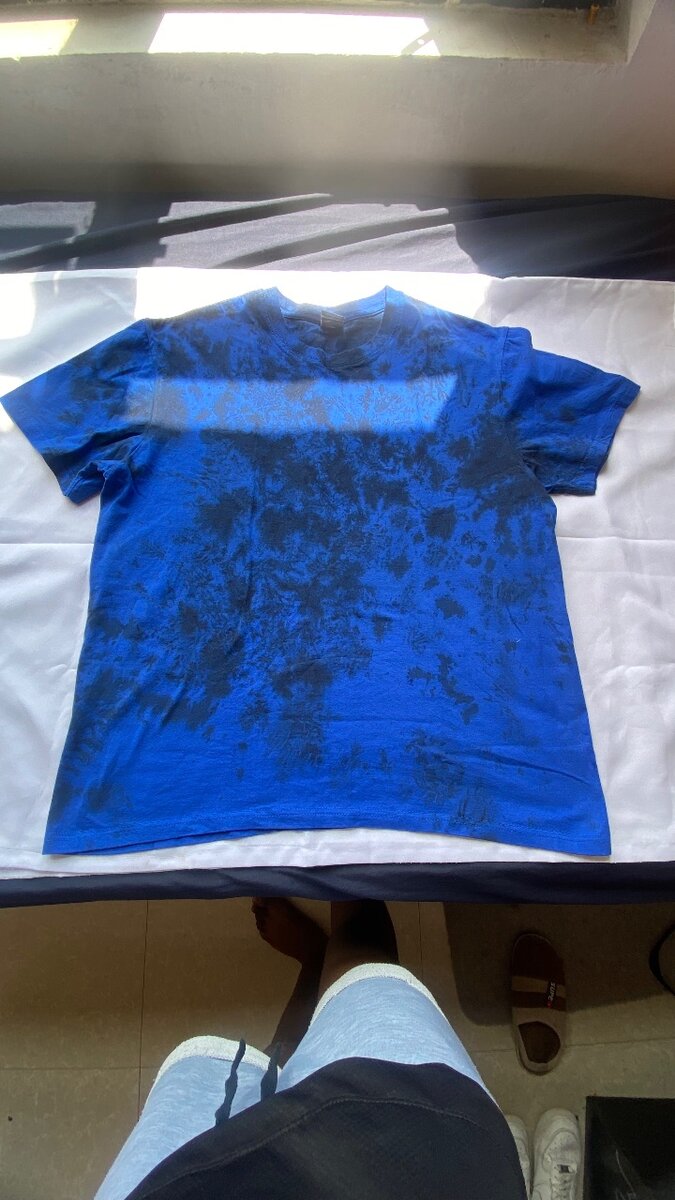 Red shirt, blue floral dress, blue tie and dye shirt