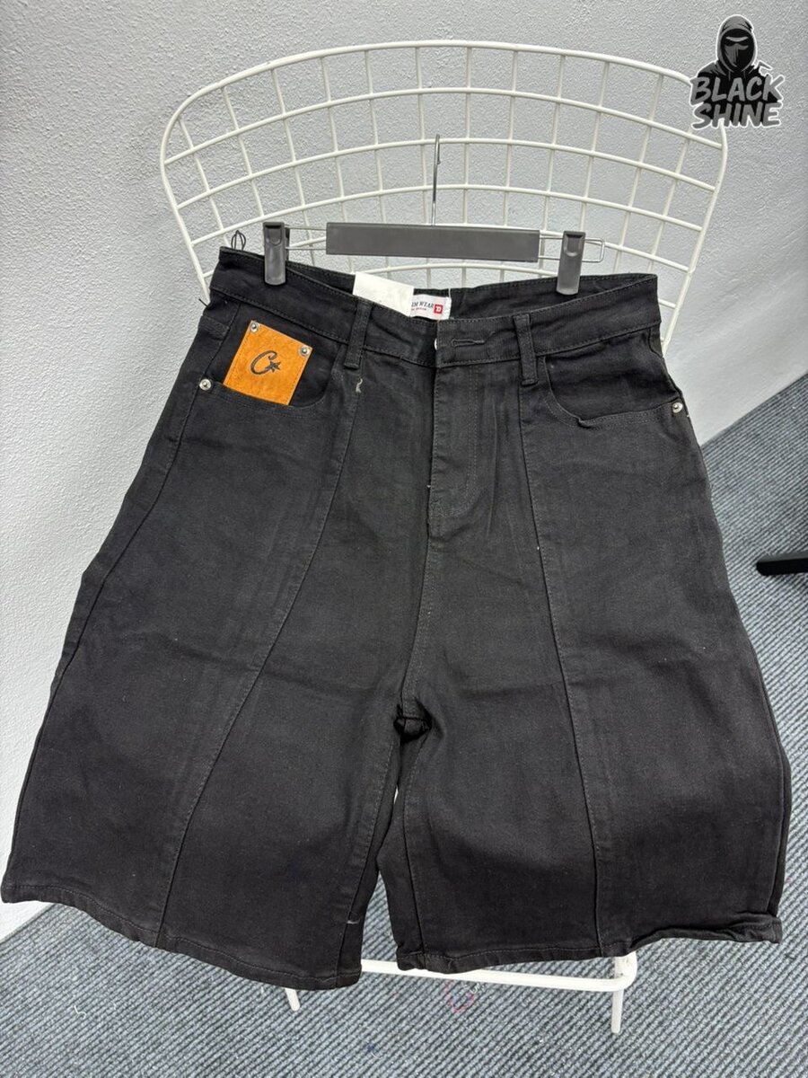 Shorts noirs avec motif étoile