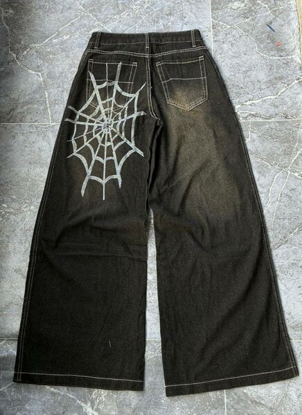 Jean large avec toile d'araignée