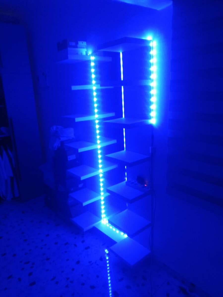 Floating shoe rack with mirror and LED light