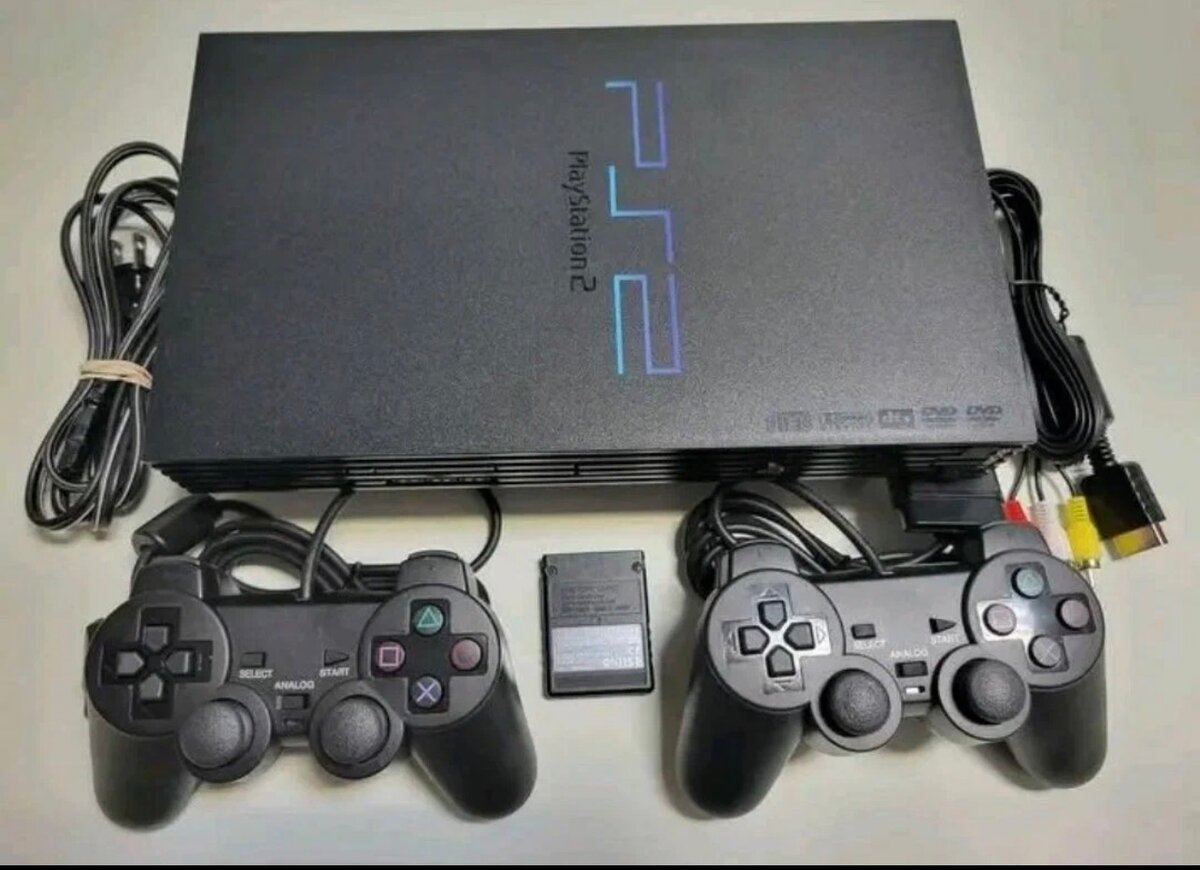 Console PS2 avec manettes