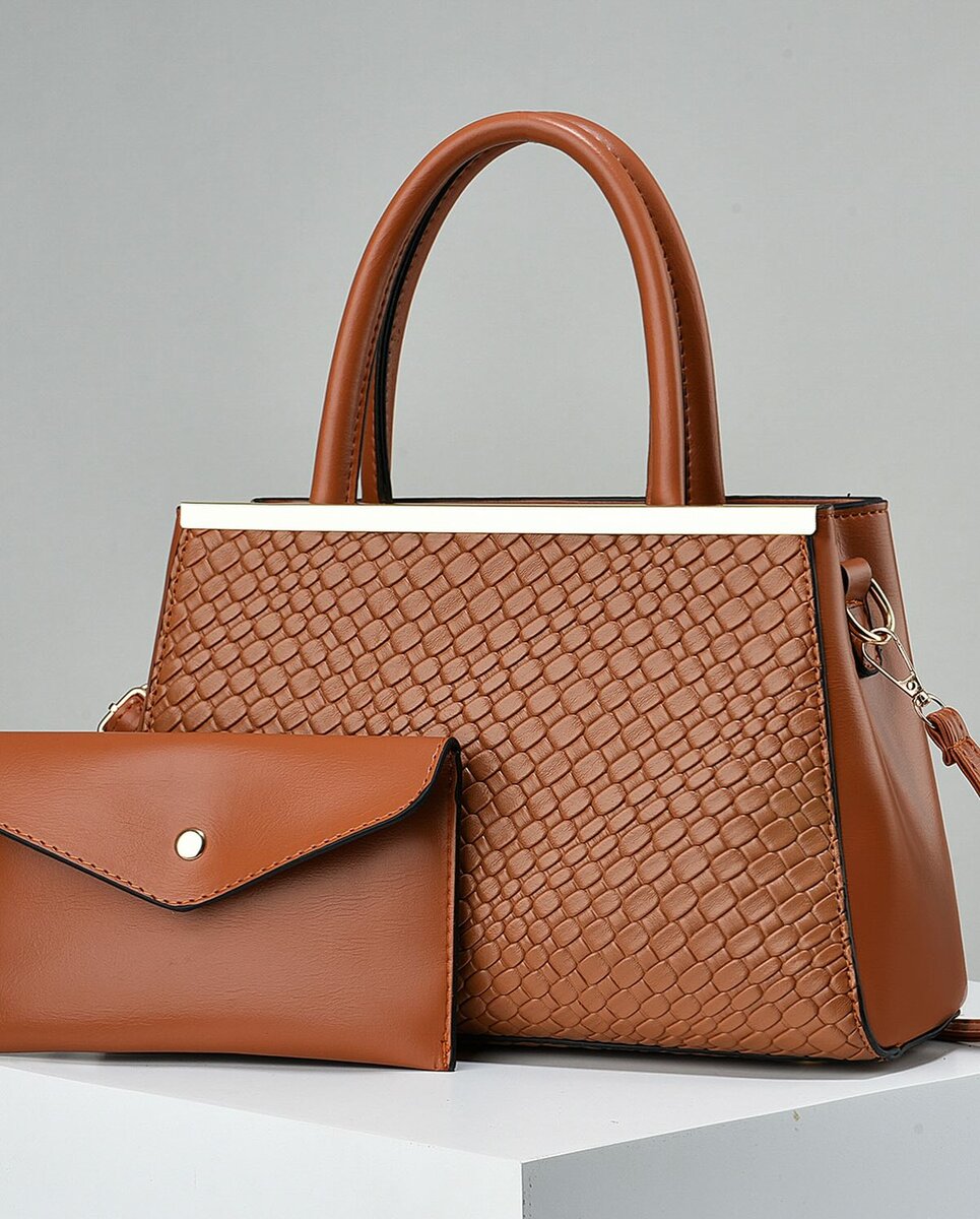 High-quality, stylish women's brown bag with an accessory