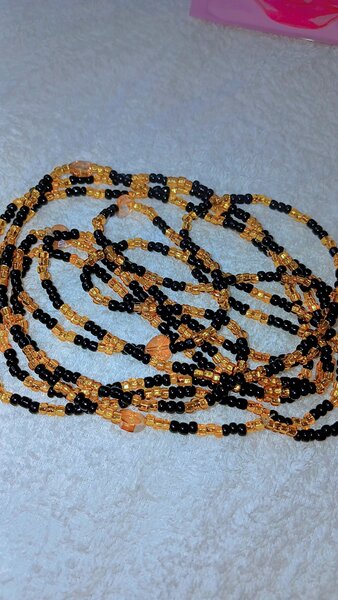 Collier perles noires et oranges