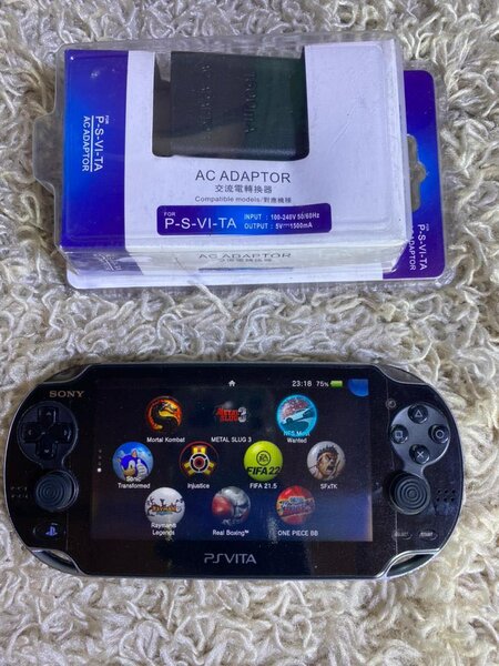 PS vita fat  occasion +20 jeux installés