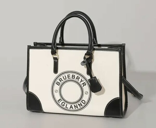 Sac à main élégant en cuir noir et blanc