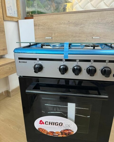 Chigo 4 burner gas stove/ Grill & Rotisserie Oven.