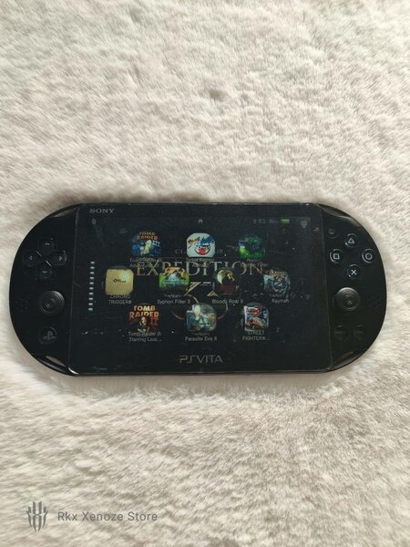 Sony PS Vita noir + 60 jeux