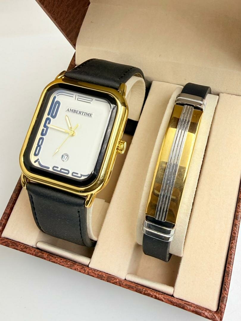 Montre élégante noire et or